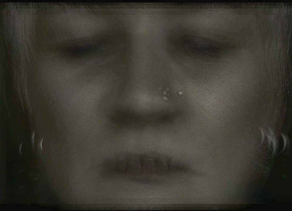 Untitled #19, video still from the Pain Project, 2010. 